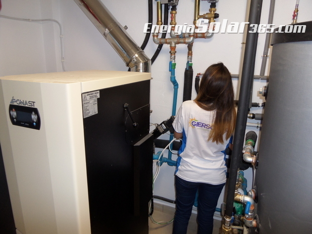 Instalación de caldera para agua caliente sanitaria y suelo radiante